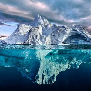 The submerged bulk of the iceberg, the processing, closing, and post-closing functions that borrowers never see, is where lenders are now directing their technology investments — and increasingly where AI is making automation newly practical.