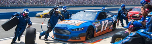 mortgage lending roles and technology parallel those of auto racing pit crews.